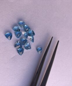 6mm swiss blue topaz trillion cut