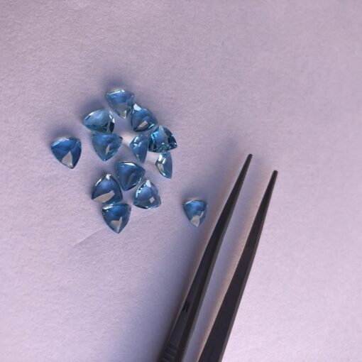 6mm swiss blue topaz trillion cut