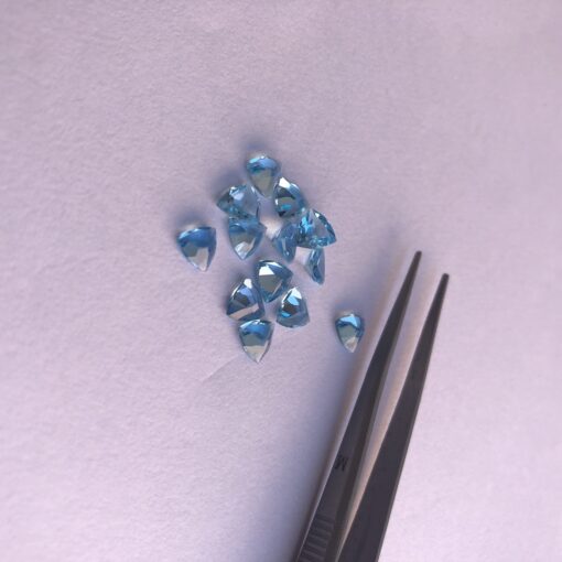 4mm swiss blue topaz trillion cut