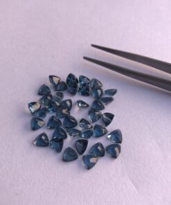 4mm london blue topaz trillion cut