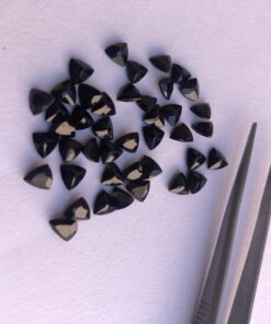 7mm black spinel trillion cut