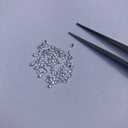 1.5mm white topaz round cut