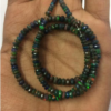 Shop Natural Black Ethiopian Opal Faceted Rondelle Beads