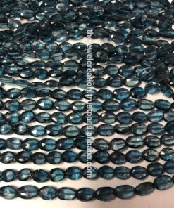 Shop London Blue Topaz Faceted Oval Beads Strand