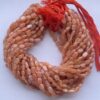 Natural Peach Moonstone Smooth Oval Beads Strand