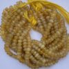 Shop 6mm 8mm Natural Yellow Onyx Smooth Rondelle Beads