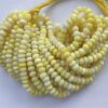 Shop 6mm 8mm Lemon Yellow Opal Smooth Rondelle Beads